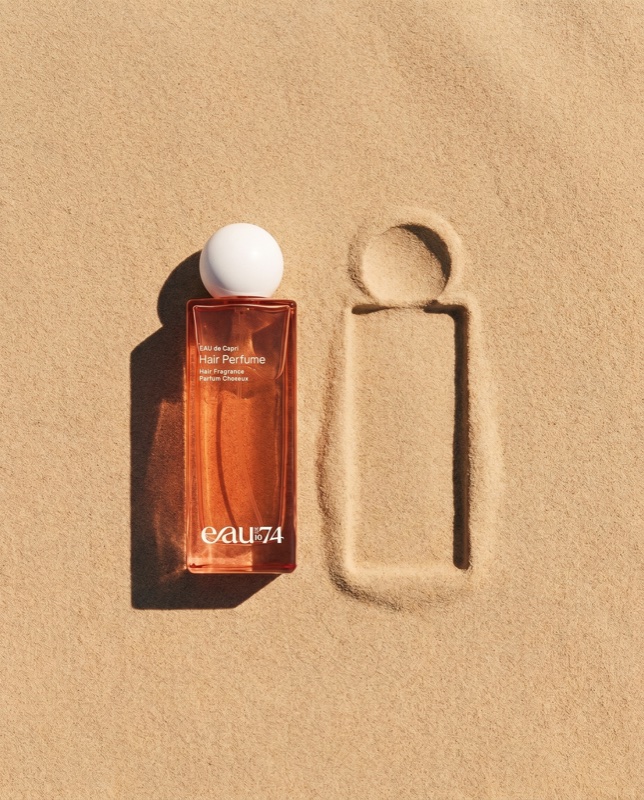 Solvea Capri Hair Perfume on sand beside its own imprint